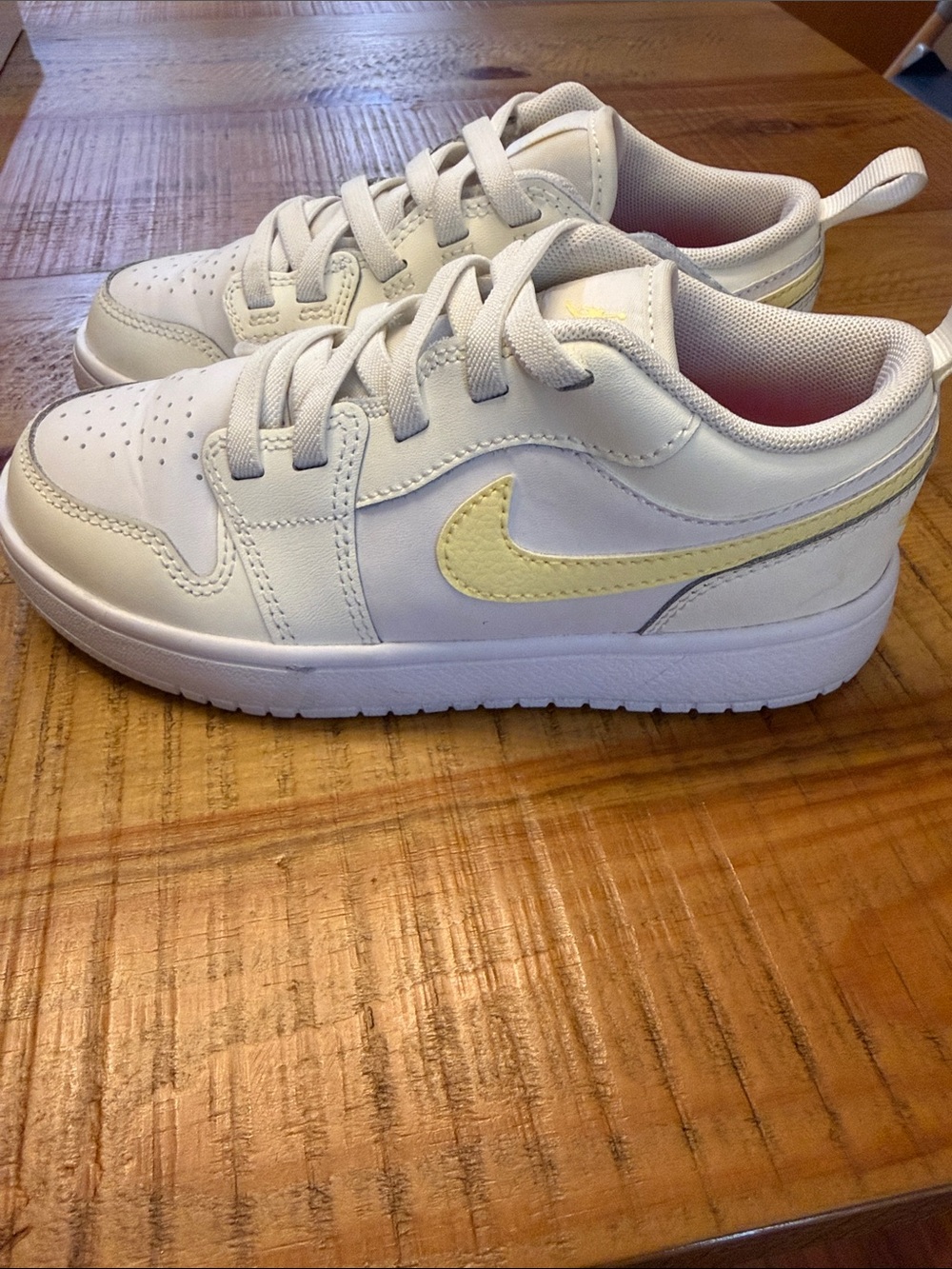 Nike Kids White Sneakers with Pale Yellow Swoosh Accent worn twice